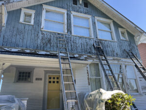 West Seattle Home Exterior Painting Prep for Blue New Paint